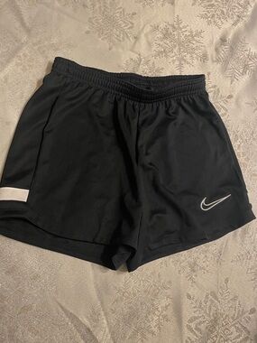 Nike Black Women’s Athletic Shorts with White Swoosh Accent